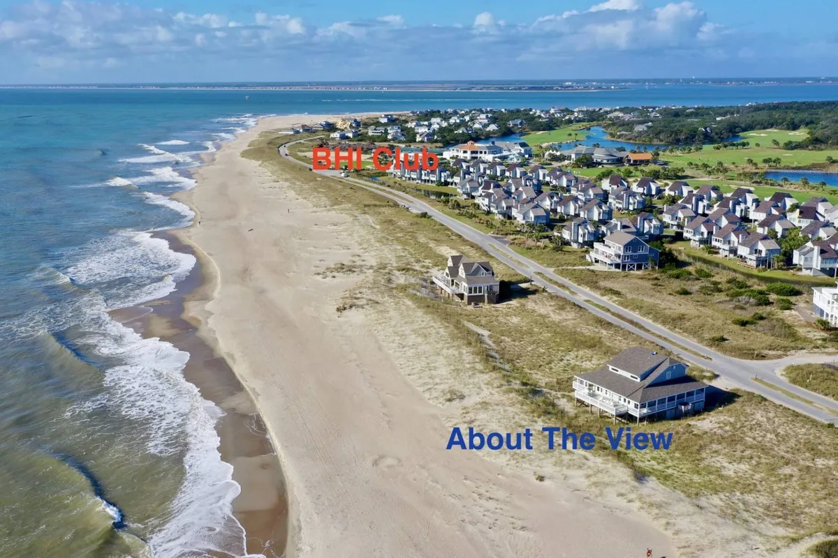 This image features a wide beach with children building sandcastles, families enjoying beach activities, and the beach club in the background. The ocean glistens under late afternoon sunlight, setting a playful and vibrant scene that captures the heart of family-friendly beachfront living.